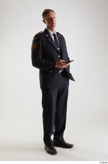 Sam Atkins Firefigter in Ceremonial Uniform with Cell Phone standing…